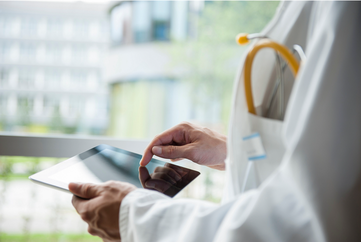 Man holding a tablet